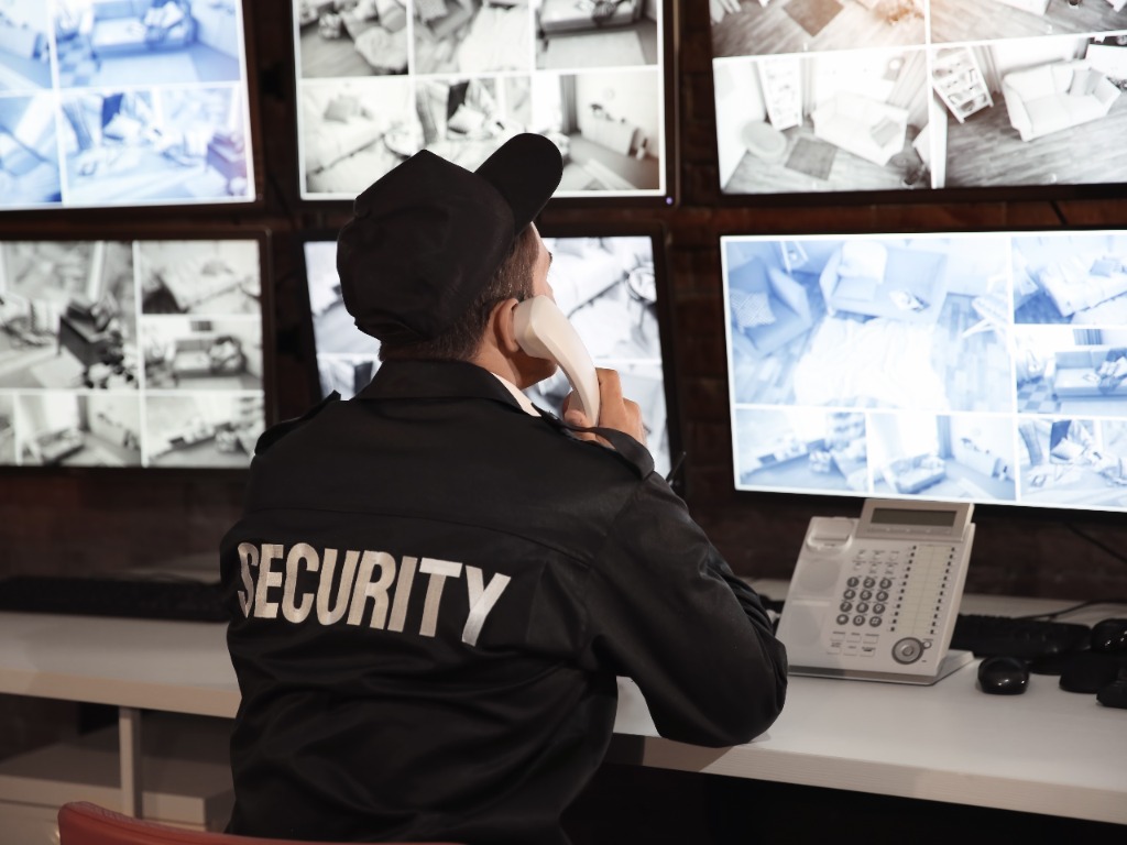 security guard is monitoring surveillance system